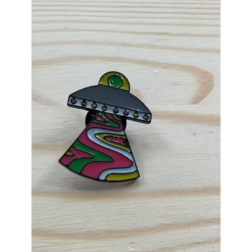 Retro UFO Enamel Pin With Vibrant Swirl Design